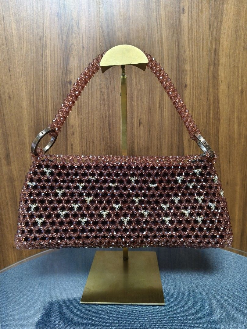 Vintage-Inspired Crystal Beaded Bag Rare (Category: Shoulder Bags) located in Baguio. Submitted by PreiLoveMaria (Listing ID 1437385404, Image 2). Description: Vintage-Inspired Crystal Beaded Bag ​Vintage-inspired beaded baguette bag, Handcrafted with intricate crystalline beadwork, this piece adds a touch of timeless elegance to any outfit. ​Product Highlights ​Intricate open-weave beadwork with clear crystal floral accents. ​Spacious interior, 
