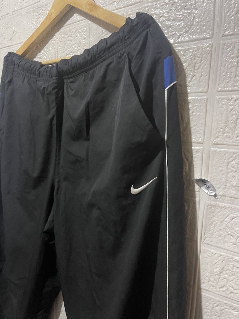 Y2K Nike Dry Fit Track Pants (Category: Joggers) located in Quezon City. Submitted by davidso682 (Listing ID 1437351608, Image 2). Description: - Nike track pants - Size: XL - Color: Black with white and blue accents - Features Nike logo - Side and back stripe detail - Made in China - Nike Dry Fit technologyn NIKE Y2K TRACKPANTS FREEWAIST up to 40 Length 40 Hem 9.5 As new Condition No issue 950 .