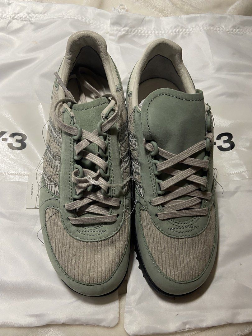 Y-3 Adidas (Category: Sneakers) located in Badoc. Submitted by fourforfourtrift (Listing ID 1437313178, Image 2). Description: - Y-3 Runner 4D Low sneakers - Color: Green and Grey - Features Y-3 logo - Includes original Y-3 dust bag - Made in China - Size: US 4.5 / UK 4 / JP 225 / CHN 225 - Unique textured sole.
