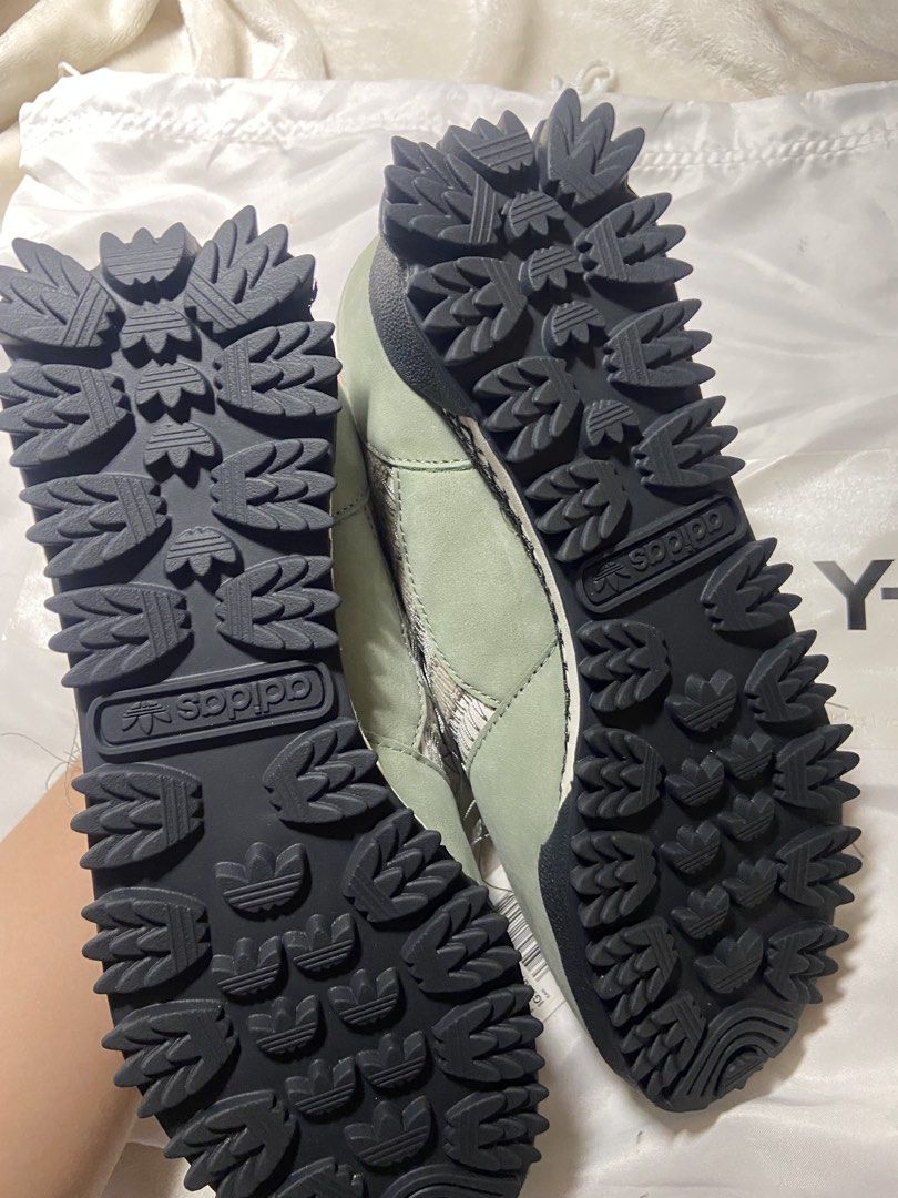 Y-3 Adidas (Category: Sneakers) located in Badoc. Submitted by fourforfourtrift (Listing ID 1437313178, Image 3). Description: - Y-3 Runner 4D Low sneakers - Color: Green and Grey - Features Y-3 logo - Includes original Y-3 dust bag - Made in China - Size: US 4.5 / UK 4 / JP 225 / CHN 225 - Unique textured sole.