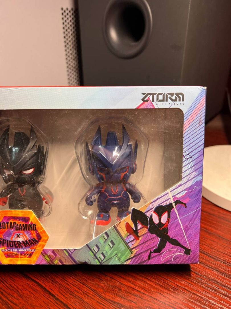 Zotac Gaming x Spider-Man: Across the Spider-Verse Mini Figures Set Collection (Category: Toys & Games) located in Baguio. Submitted by ditoyzb08176 (Listing ID 1437345182, Image 2). Description: - Zotac Gaming Spider-Man Figurine Set - Includes three different Spider-Man designs - Features the Zotac Gaming logo and "Power the Hero in You" on the box - Figurines are in original packaging -RARE Gaming FIG Location: BAguio City Shipping: J&T/FLASH/