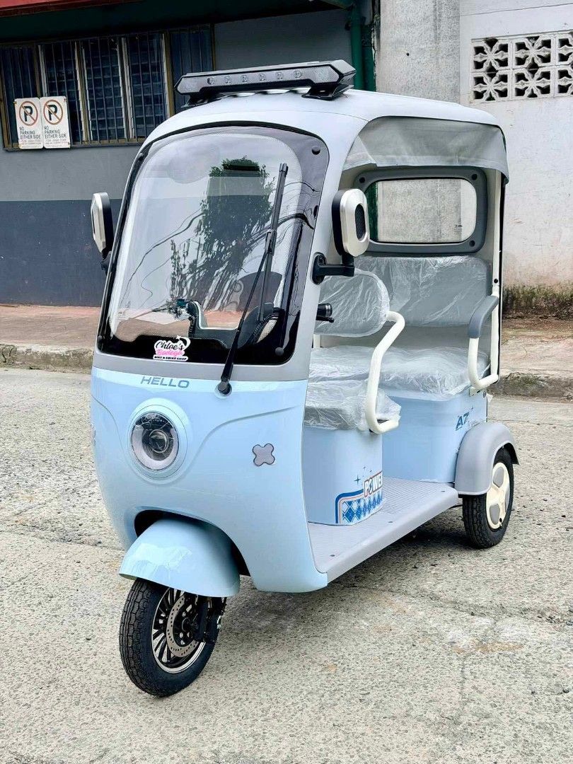 A7 v1 3 wheels ebike (Category: Home Improvement Tools & Accessories) located in Manila. Submitted by dolorchris69891 (Listing ID 1437431310, Image 3). Description: A7 v1 is here ❤️‍🔥 3wheels na fully Covered 57,000 FREE DELIVERY WITHIN METRO MANILA, BULACAN, CAVITE AND LAGUNA (Cash on delivery) ✔3-4 seaters ✔2000w ✔60v20ah ✔45-50kph ✔Automatic wiper ✔key-less Remote ✔front Discbreak ✔Alloy rim Set ✔Raincoat Cover ✔Overhead light ✔mini fan ✔Reve