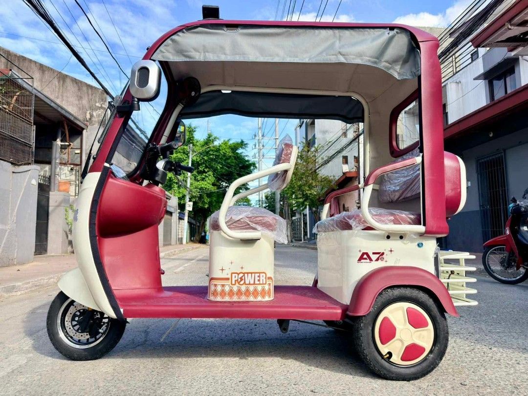 A7 v1 3 wheels ebike (Category: Home Improvement Tools & Accessories) located in Manila. Submitted by dolorchris69891 (Listing ID 1437431310, Image 2). Description: A7 v1 is here ❤️‍🔥 3wheels na fully Covered 57,000 FREE DELIVERY WITHIN METRO MANILA, BULACAN, CAVITE AND LAGUNA (Cash on delivery) ✔3-4 seaters ✔2000w ✔60v20ah ✔45-50kph ✔Automatic wiper ✔key-less Remote ✔front Discbreak ✔Alloy rim Set ✔Raincoat Cover ✔Overhead light ✔mini fan ✔Reve