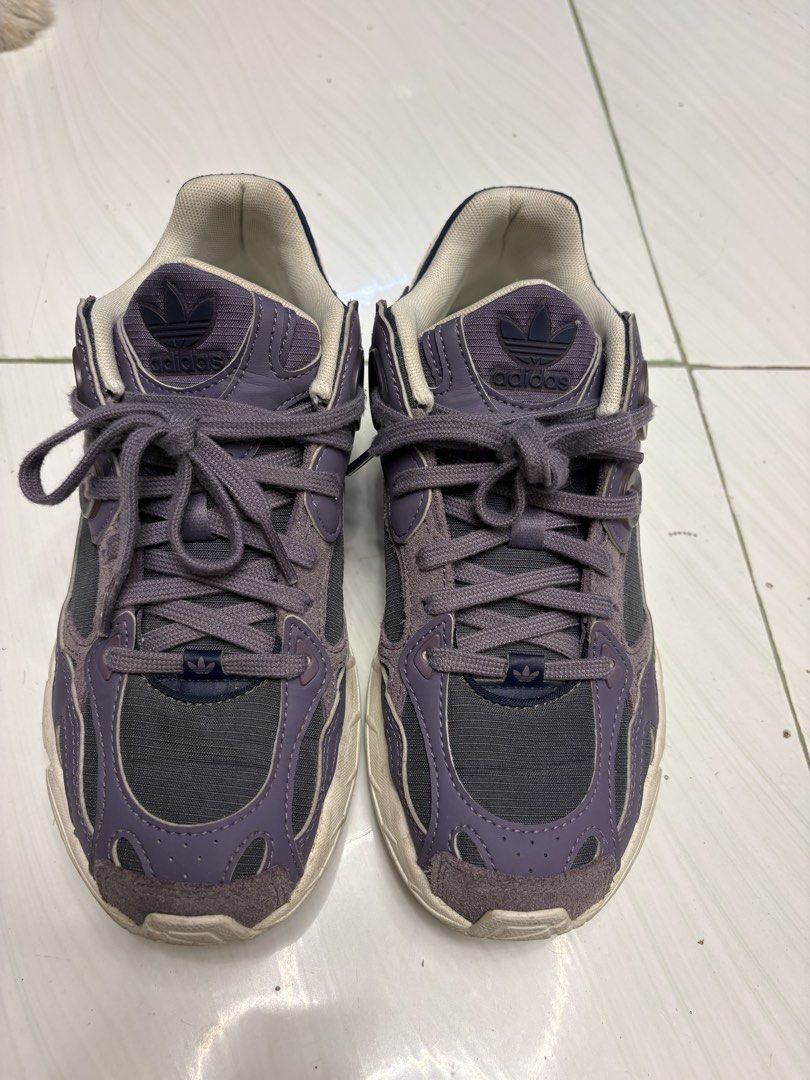 Adidas Purple Sneakers Original (Category: Sneakers) located in Imus. Submitted by s.h_aa (Listing ID 1437482426, Image 2). Description: - US 5.5 womens - Color: Purple and Navy - Used less than 10 times. Just needs cleaning - bought for 5k in adidas outlet store - slightly negotiable.