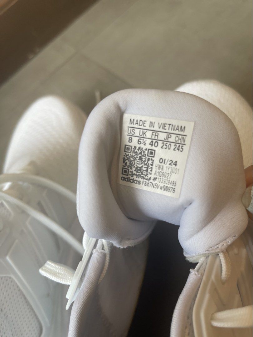 Adidas Ultraboost White Sneakers (Category: Sneakers) located in Mandaluyong City. Submitted by manilasyoungstunna (Listing ID 1437486432, Image 3). Description: Bought in an outlet in the US Never worn In amazing condition, pure white & smells like new shoe Logo inside worn off & some small marks due to handling (see last slide) Great basic shoe PRICE NEGOTIABLE! MESSAGE for more details - Adidas Ultraboost sneakers - Color: White - Size: UK 6.5