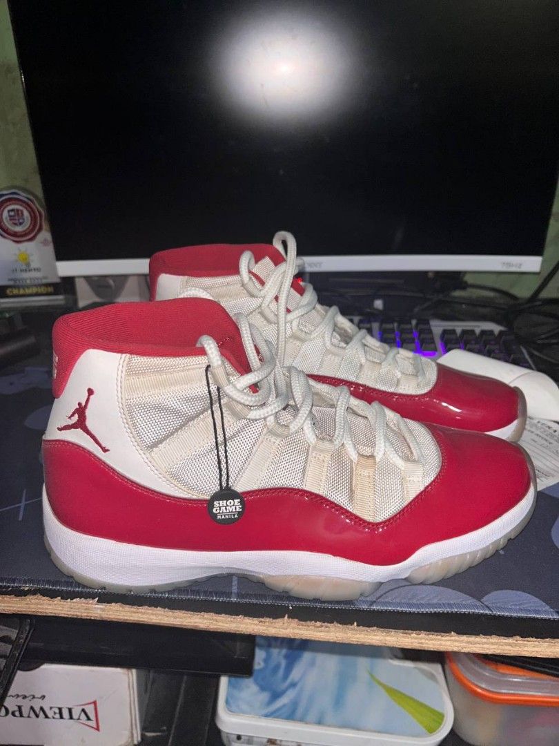 Air Jordan 11 Retro Cherry (Category: Sneakers) located in Manila. Submitted by stylish_thrift (Listing ID 1437494197, Image 1). Description: - Air Jordan 11 Retro 'Cherry' - Red patent leather upper - White mesh and accents - White laces - Translucent outsole - Jumpman logo visible - Yellowish Color - 4 Times used - 16,000 ORIG Price - Buy in shoe game manila - With box but sira konti sa katagalan - Negotiable - Can do meetupo or video call to c