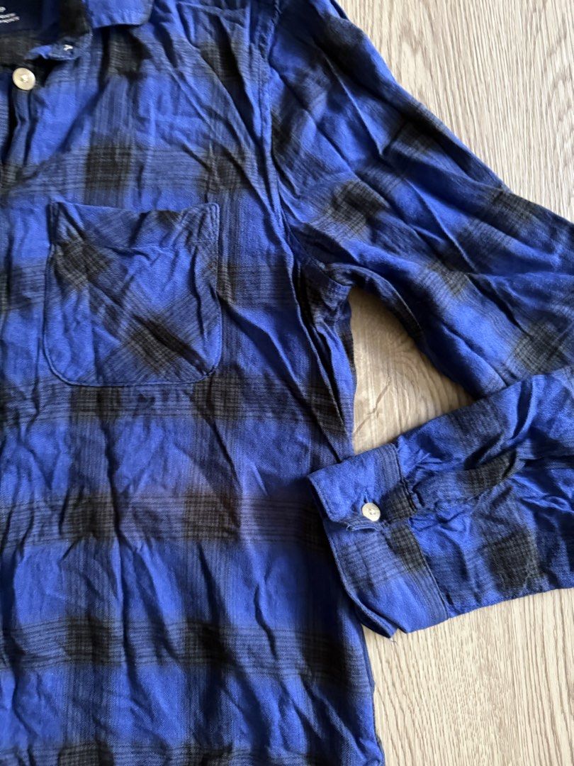 American Eagle Outfitters Plaid Shirt (Category: Tshirts & Polo Shirts ) located in Pasig City. Submitted by anjeg (Listing ID 1437406972, Image 3). Description: - American Eagle Outfitters plaid shirt - Color: Blue and black - Size: S/P - Features: Button-down front, single chest pocket, long sleeves with buttoned cuffs - Classic collar - Made in Indonesia.
