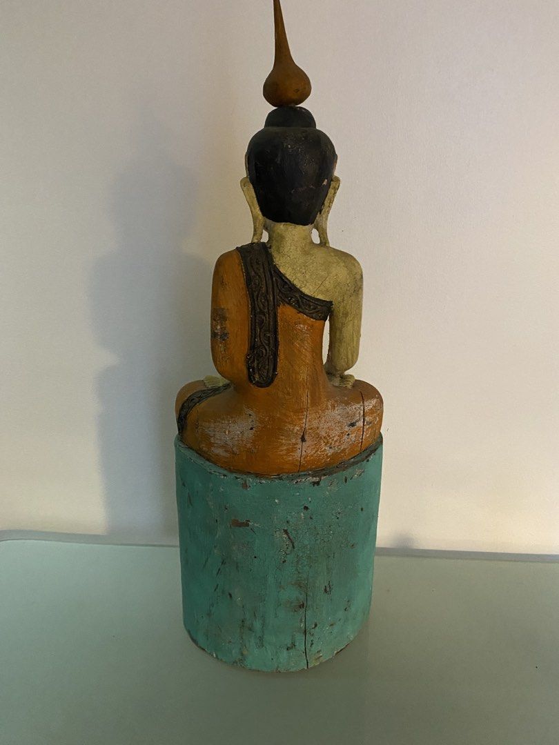 Antique Wooden Buddha Statue (Category: Other Home Decor) located in Manila. Submitted by hcrowe194878225 (Listing ID 1437402666, Image 1). Description: - Exquisite wooden Buddha statue - Intricate details and vibrant colors - Includes an elongated spire on the head - A unique art piece.