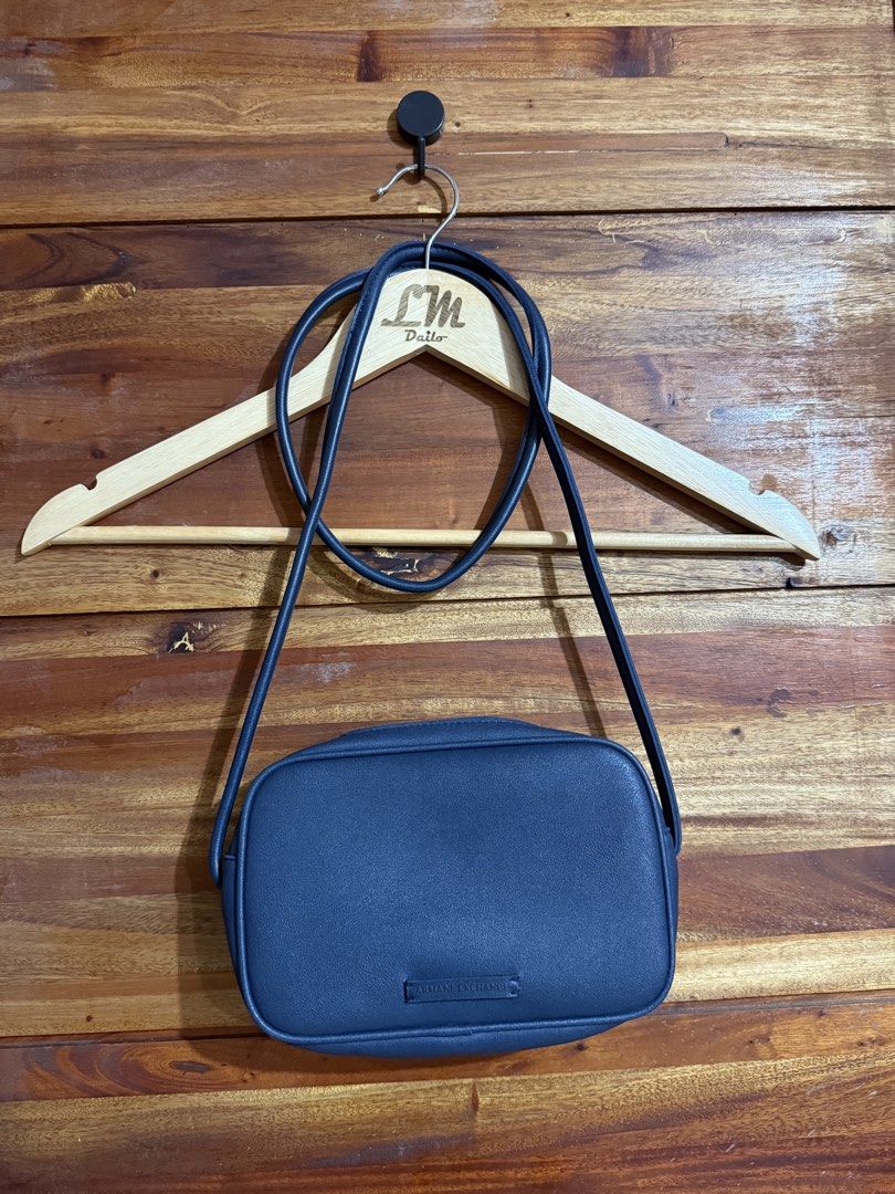 Armani Exchange Sling Bag Navy Blue (Category: Luxury Bags & Wallets) located in San Pablo. Submitted by lmdailo (Listing ID 1437456828, Image 2). Description: Condition: Likenew Color:Navy Blue Original 💯 galing Us .