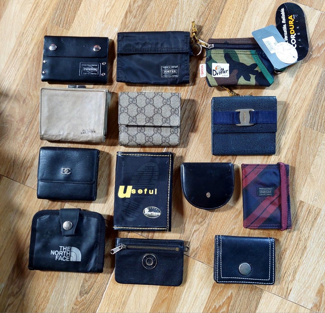 Assorted Wallets - Gucci, Marc Jacobs, Porter (Category: Luxury Bags & Wallets) located in Puerto Princesa. Submitted by YeSurJOMS (Listing ID 1437430900, Image 2). Description: Collection of various wallets, including brands like Gucci, Marc Jacobs, and Porter. Features different styles, colors, and sizes. Some wallets have visible logos and designs. Includes a variety of materials and closures. Perfect for organizing your essentials..