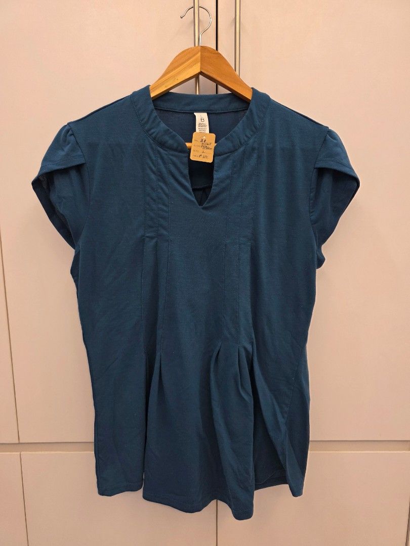 B Shirt Teal Blue Size L (Category: Blouses) located in Padre Garcia. Submitted by strikerz101 (Listing ID 1437500160, Image 2). Description: - Teal blue shirt - Brand: B - Size: L - V-neck design - Short sleeves - Soft material - With tag attached.