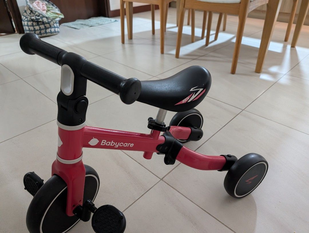 Babycare Tricycle (Category: Infant Playtime) located in Caloocan City. Submitted by jnnyteh-16269 (Listing ID 1437526463, Image 1). Description: Babycare tricycle is perfect for toddlers. It features a pink frame with black accents, including the seat and wheels. The tricycle has a comfortable seat and handlebars for easy steering. It has pedals for the child to use. original from babycare imported from china. very good quality .