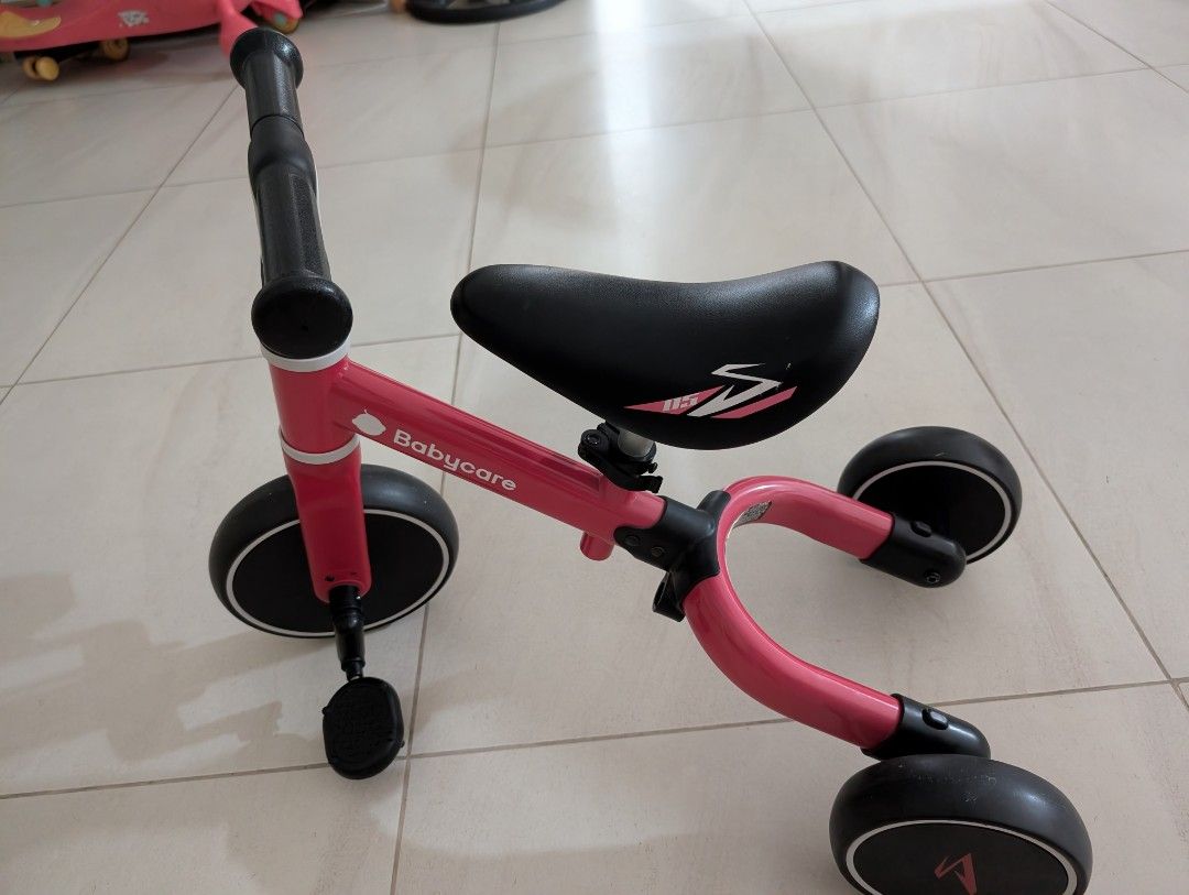 Babycare Tricycle (Category: Infant Playtime) located in Caloocan City. Submitted by jnnyteh-16269 (Listing ID 1437526463, Image 2). Description: Babycare tricycle is perfect for toddlers. It features a pink frame with black accents, including the seat and wheels. The tricycle has a comfortable seat and handlebars for easy steering. It has pedals for the child to use. original from babycare imported from china. very good quality .