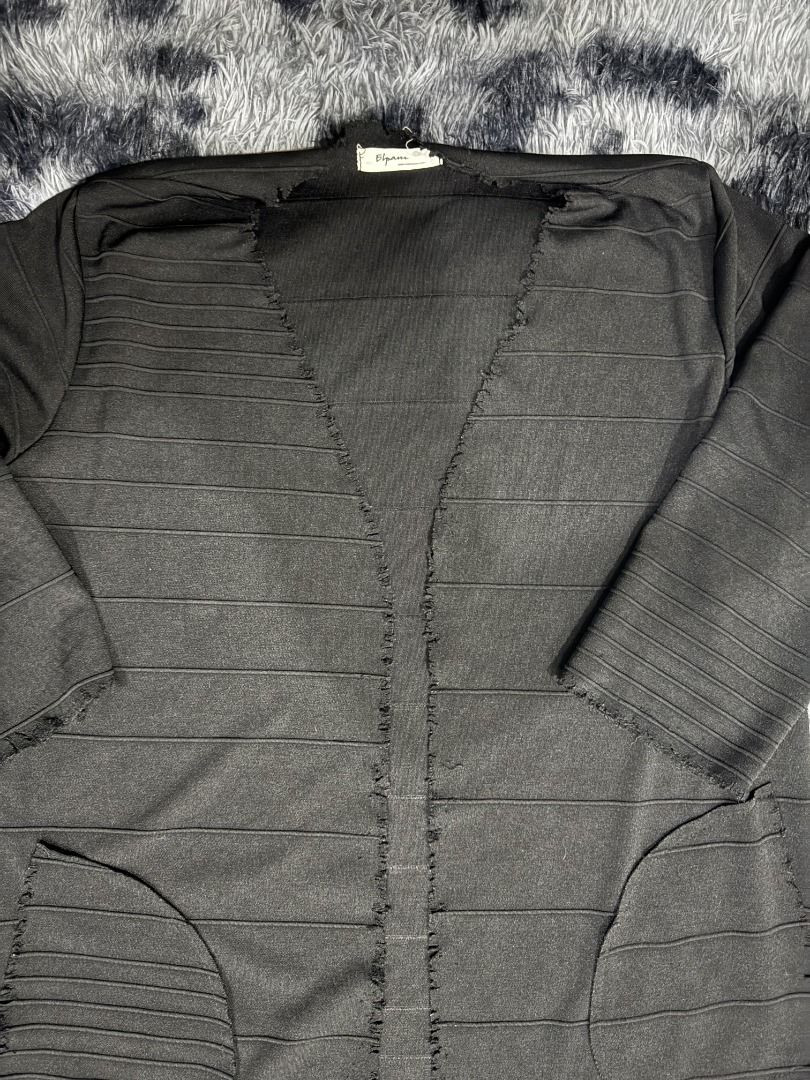 Black Ribbed Distressed Cardigan with Pockets (Category: Coats, Jackets and Outerwear) located in Puerto Princesa. Submitted by 22B_Garments (Listing ID 1437457958, Image 3). Description: WIDTH: 21 LENGTH: 32 - Black cardigan - Ribbed design - V-neck - Three-quarter sleeves - Two front pockets - Raw, unfinished edges Tornado Mart 14th Addiction Roen ifsixwasnine Y2K Visual Kei VKEI Semantic Design In The Attic Vuja De cmmawear PAF Post Archive Fa
