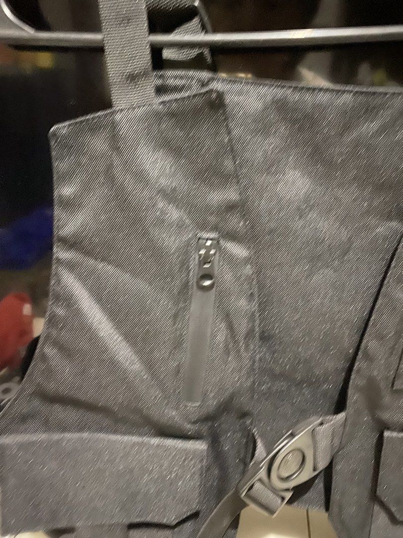 Black Tactical Vest with Multiple Pockets (Category: Vests) located in Manila. Submitted by resi.diaz (Listing ID 1437576137, Image 3). Description: - Black tactical vest - Multiple pockets for storage - Adjustable straps for a custom fit - Zipper pocket included - Several pouches for storage - Secure buckle closure - Made of durable fabric.