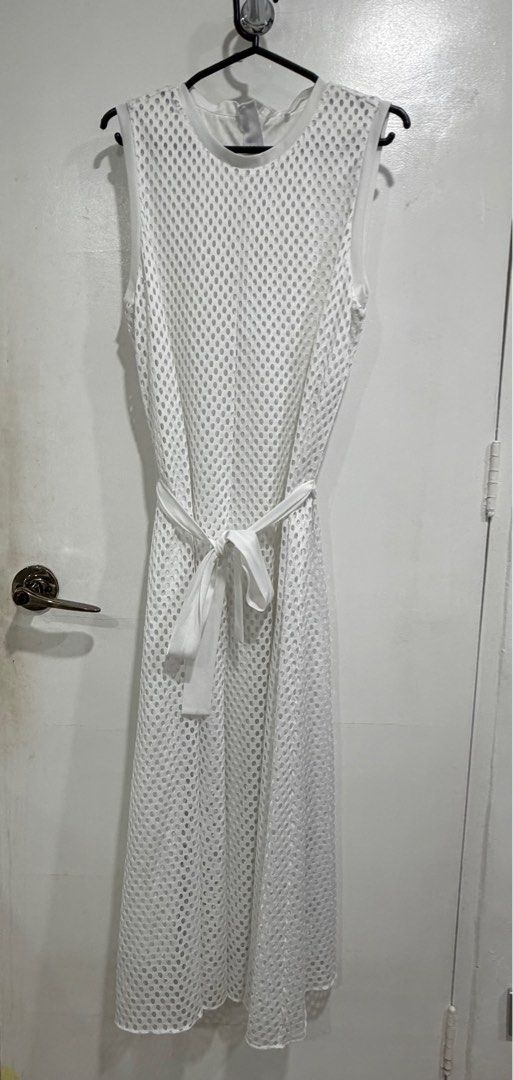BOSS White Sleeveless Mesh Dress (Category: Dresses) located in Makati City. Submitted by citysunset (Listing ID 1437513076, Image 2). Description: - White sleeveless midi dress - Features mesh design - Includes matching tie belt - Round neckline - Perfect for summer or casual events - Simple and chic design.