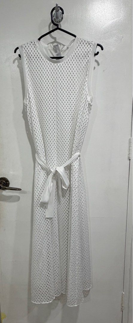 BOSS White Sleeveless Mesh Dress (Category: Dresses) located in Makati City. Submitted by citysunset (Listing ID 1437513076, Image 1). Description: - White sleeveless midi dress - Features mesh design - Includes matching tie belt - Round neckline - Perfect for summer or casual events - Simple and chic design.