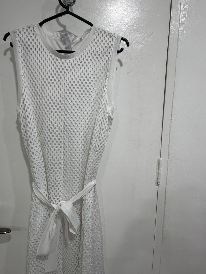 BOSS White Sleeveless Mesh Dress (Category: Dresses) located in Makati City. Submitted by citysunset (Listing ID 1437513076, Image 3). Description: - White sleeveless midi dress - Features mesh design - Includes matching tie belt - Round neckline - Perfect for summer or casual events - Simple and chic design.