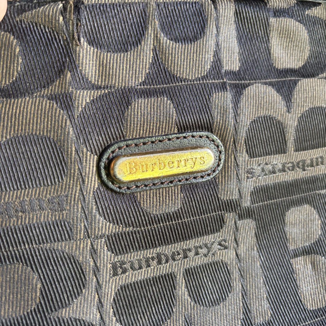 Burberrys London Shoulder Bag (Category: Luxury Bags & Wallets) located in Banga. Submitted by akosiloco (Listing ID 1437482364, Image 3). Description: - Authentic Burberrys London shoulder bag - Classic monogram pattern - Leather strap - Gold-tone buckle - Interior pocket - "Burberrys London Made in Italy" interior tag.