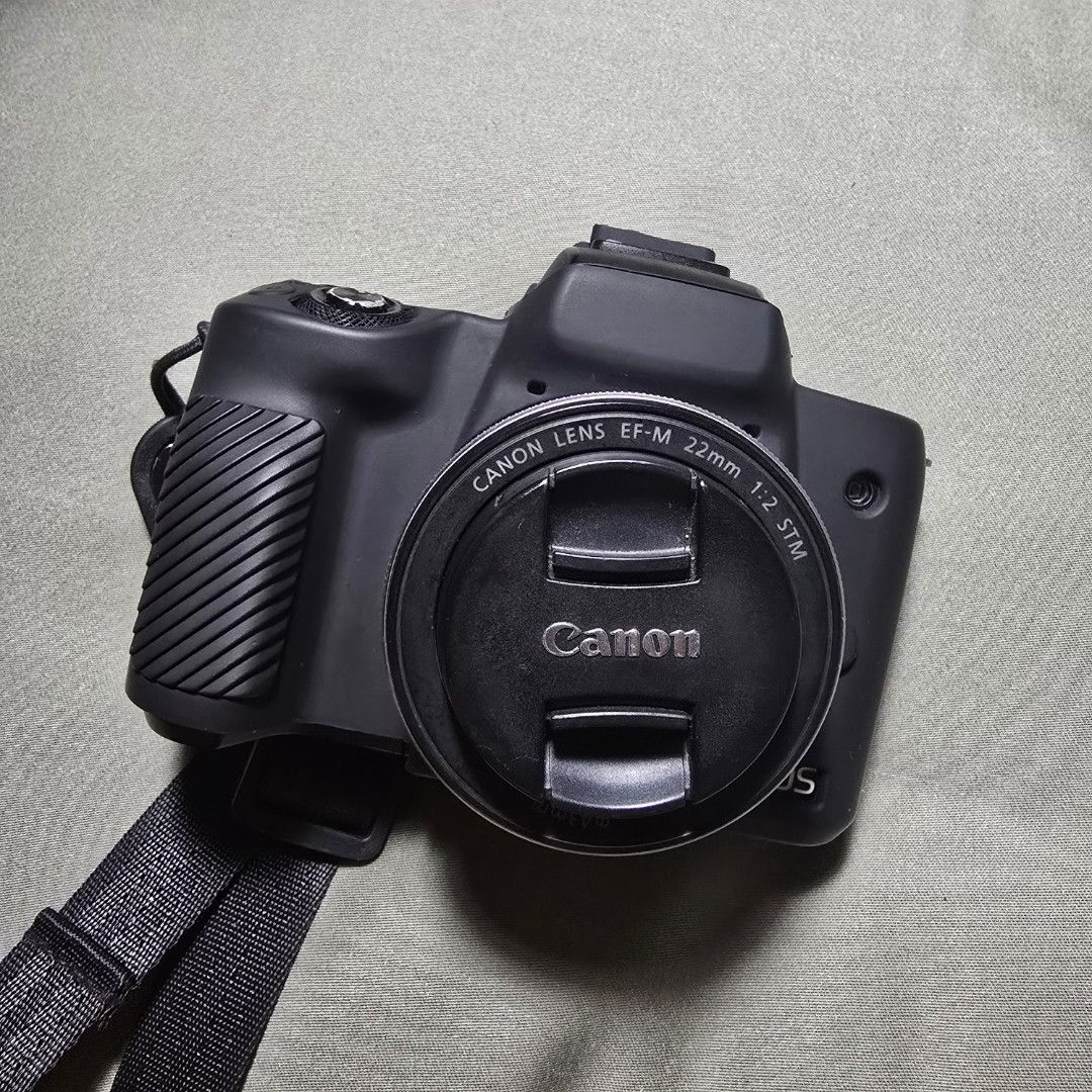 Canon EOS M50 mark I (Body Only) (Category: Cameras) located in Manila. Submitted by llianaj (Listing ID 1437516037, Image 1). Description: - Canon EOS M50 camera (body) - Includes charger - Two original batteries included - Comes with a camera strap - Black camera body Freebie: Camera bag WELL USED FOR COVERAGE AND TRAVELS! MINOR COSMETIC ISSUES MEET UP ONLY!!! MOP: GCASH/GOTYME.