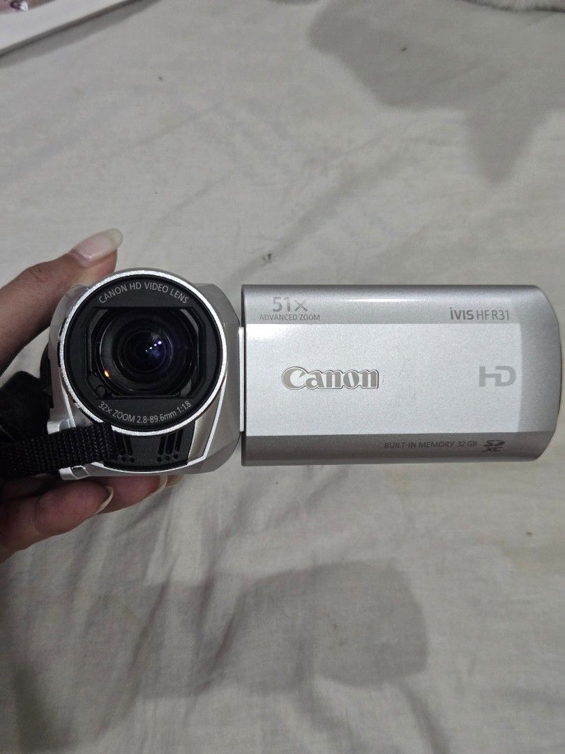 Canon iVIS HFR31 Camcorder (Category: Video Cameras) located in Manila. Submitted by asdfghjklaine07 (Listing ID 1437442197, Image 2). Description: - Canon iVIS HFR31 camcorder *2012) - Records HD video - Silver color - 3 89 megapixel - Upto 32x optical zoom - SDXC card compatible - HDMI output - Includes original box, charger, cords, dvd, manuals etc. - free SD card.