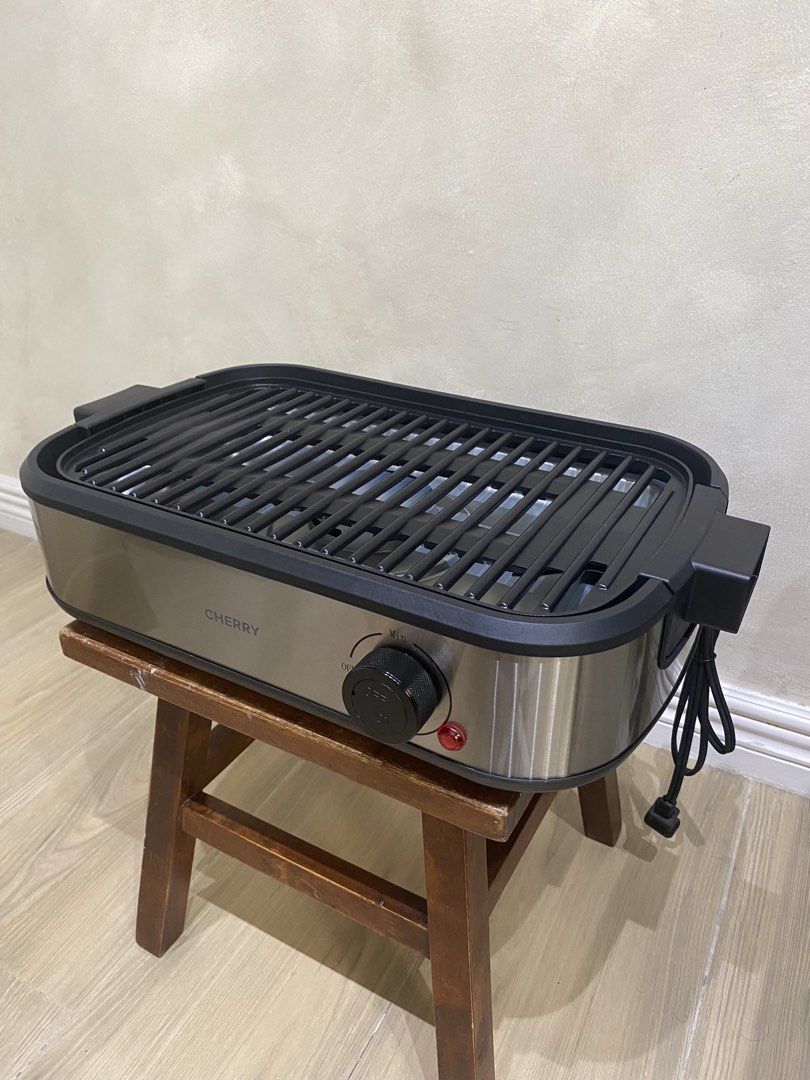 Cherry | Easy Smokeless BBQ Grill (Category: BBQ, Grills & Hotpots) located in Manila. Submitted by papupeeps (Listing ID 1437483785, Image 1). Description: Smokeless Grilling: Equipped with a built-in carbon filter to trap smoke and grease particles, making it perfect for apartments and condos. Precision Control: Adjustable temperature dial ranging from 80°C to 230°C for everything from gentle warming to high-heat searing. Healthier Cooking: Fea