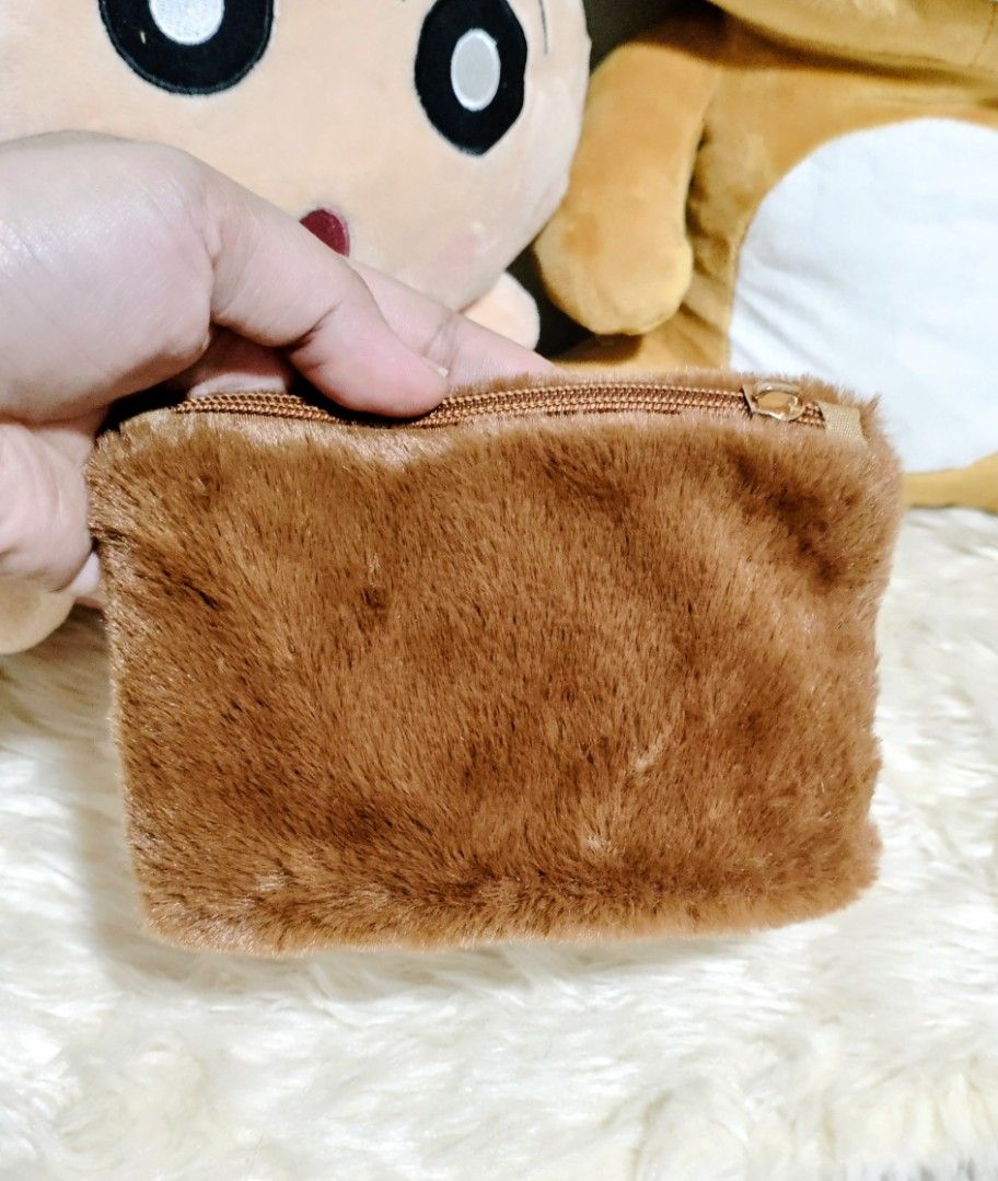 CHIP' N' DALE Coin Purse (Category: Purses & Pouches) located in Manila. Submitted by yourfavoritethings7 (Listing ID 1437465291, Image 2). Description: Made of cloth material. Easily foldable May missing piece lang sa zipper as seen on picture. Working ang zipper..