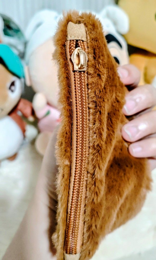 CHIP' N' DALE Coin Purse (Category: Purses & Pouches) located in Manila. Submitted by yourfavoritethings7 (Listing ID 1437465291, Image 3). Description: Made of cloth material. Easily foldable May missing piece lang sa zipper as seen on picture. Working ang zipper..