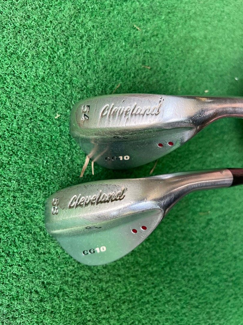 Cleveland CG10 Golf Wedges Set (Category: Golf) located in Manila. Submitted by gasparjuico (Listing ID 1437416773, Image 2). Description: Selling my Cleveland CG10 wedges in 54° and 58° lofts. Both are authentic Cleveland CG10 wedges with 2-dot (mid bounce) setup. Clubs are still in very good playable condition: * Grooves still bite well * Faces and soles show normal cosmetic wear only * No cracks or structural issues * Matching Cleveland grips 