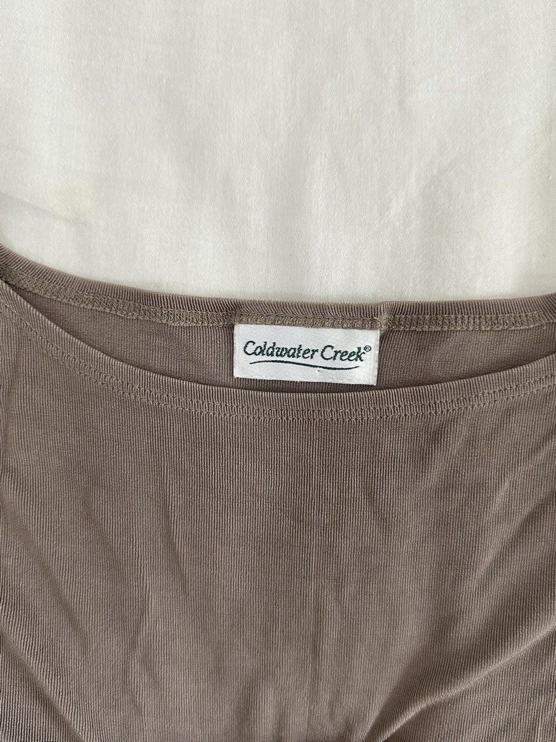 Coldwater Creek Brown off shoulder, draping top (Category: Blouses) located in Mandaluyong City. Submitted by slickestb (Listing ID 1437453408, Image 3). Description: - Coldwater Creek top - Features a boat neck - Short sleeves - Solid brown color - Made from soft, comfortable fabric - Ideal for casual wear - small - medium.