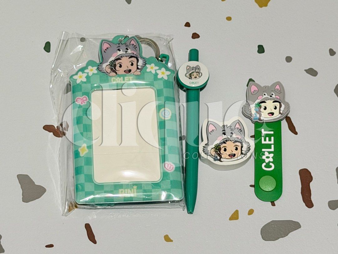 COLET NBS MERCH SET (Category: Stationery & School Supplies) located in Manila. Submitted by cliquecollections (Listing ID 1437421795, Image 1). Description: BINI COLET NATIONAL BOOKSTORE SET INCLUSIONS: - PHOTOCARD HOLDER V2 - CABLE ORGANIZER - BALLPEN - ERASER • WITH FREEBIES • FREE SECURED PACKAGING FEE • 100% OFFICIAL AND IN GOOD CONDITION.