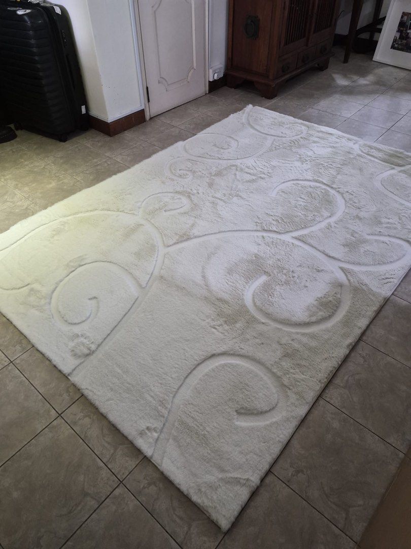 White carpet  Rug with Swirl Design