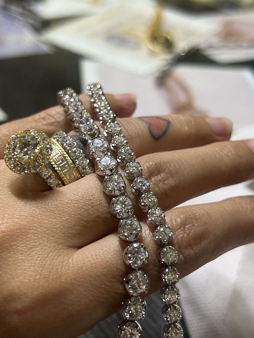 Diamond Rings and Jewelry Set (Category: Luxury Accessories) located in Manila. Submitted by jewelmixjewelry (Listing ID 1437532896, Image 3). Description: - Rings with diamond accents and gold bands - Earrings and bracelets included - Designs: round, square, and baguette-cut diamonds - Some pieces feature pearl accents - Variety of styles available.