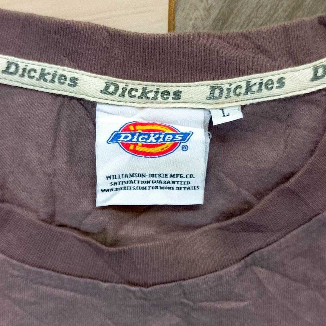Dickies Graphic T-Shirt - Size L (Category: Tshirts & Polo Shirts ) located in Manila. Submitted by caps08 (Listing ID 1437456442, Image 2). Description: - Dickies t-shirt - Size: Large - Color: Brown -Height: 26.5 -Waist: 24 - Features front and back graphic prints - Crew neck - Small Dickies logo patch on front - Made by Williamson-Dickie Mfg. Co..