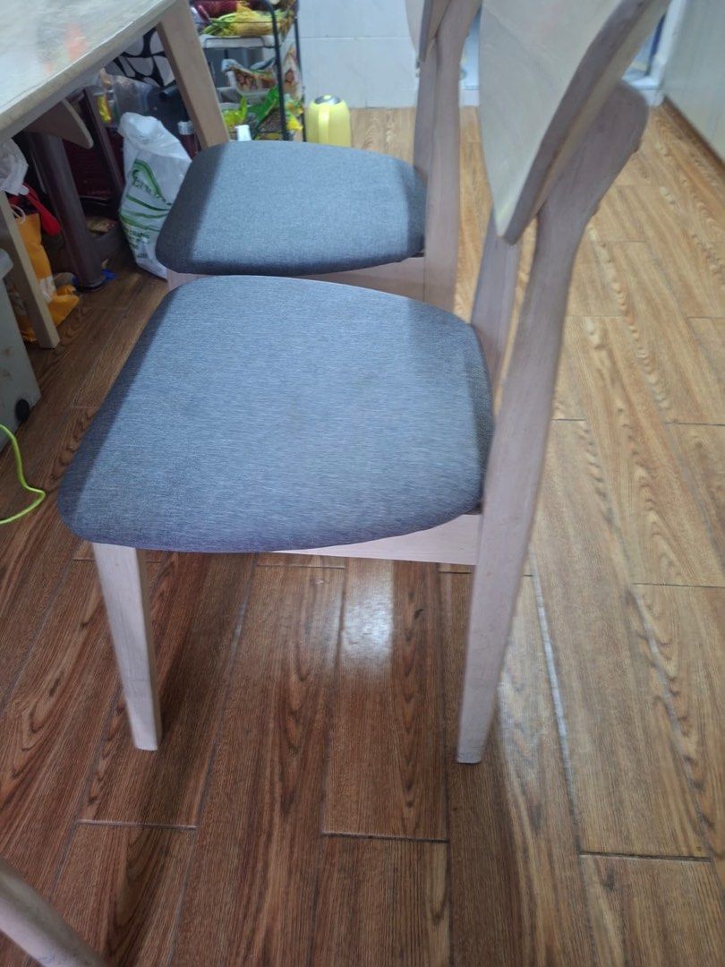 Dining Table Set (Category: Tables & Sets) located in Singapore. Submitted by durgadorita (Listing ID 1370131918, Image 3). Description: 4 grey cushioned dining chairs and a long bench that can sit upto 3pax. Seldom used and has pvc layer on top hence in very good condition. .