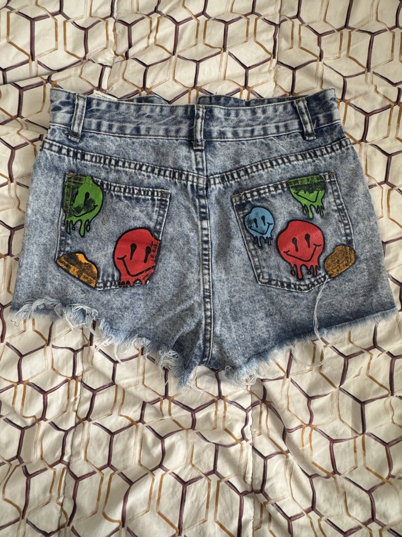 Distressed Denim Shorts with Smiley Patches (Category: Shorts) located in Manila. Submitted by yocindel (Listing ID 1437503549, Image 2). Description: - Distressed denim shorts - Light wash - Button and zipper closure - Front and back pockets - Raw hems - Smiley face patches on back - Perfect for a casual, trendy look.