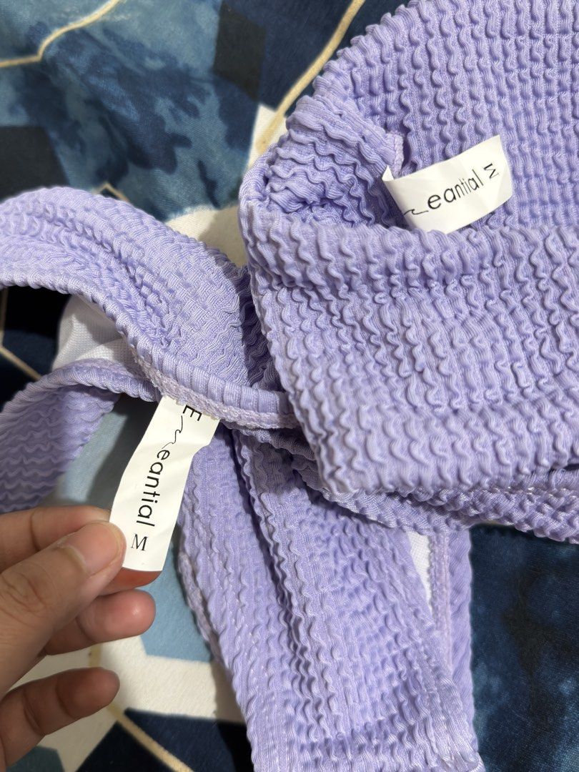 Essential Textured Bikini Set - Lavender (Category: Bikinis & Swimsuits) located in Makati City. Submitted by sofiaannedvr (Listing ID 1437534423, Image 3). Description: - Essential lavender bikini set - Size M - Textured fabric - Top: Adjustable straps, clasp closure - Bottoms: Semi High-cut - Newly bought, no when worn pictures - rfs: not flattering for me.
