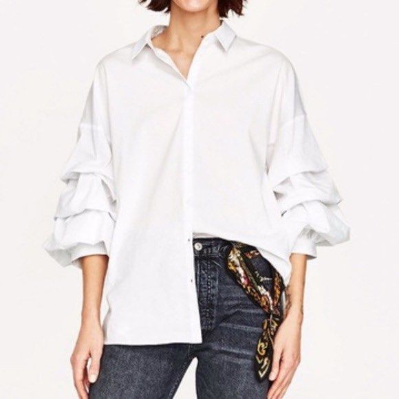 Etan Puff Tiered Sleeve Button Down Top (Category: Blouses) located in Pasig City. Submitted by shopsmart.mnl (Listing ID 1437517425, Image 1). Description: Excellent condition Fabric is of quality stretchy as well Can fit up to M.