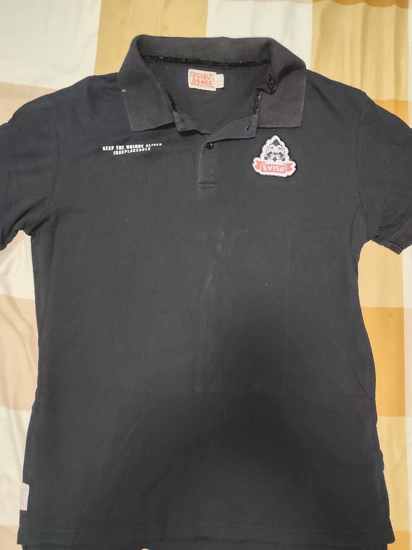 Evisu Genes Black Polo Shirt (Category: Tshirts & Polo Shirts ) located in Manila. Submitted by nsthrifty_onlineshop (Listing ID 1437531581, Image 2). Description: - Evisu Genes black polo shirt - Small logo on the chest - Short sleeves - Classic polo collar - L-27/W-19.5.