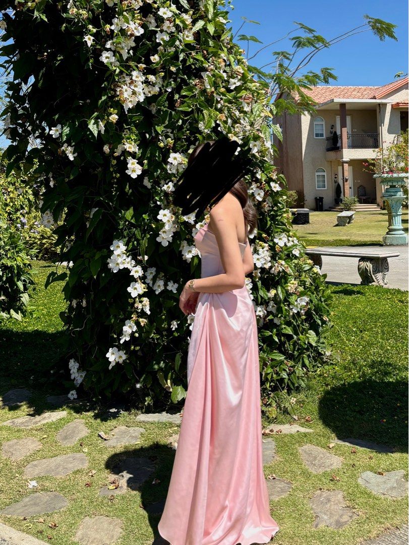 FOR RENT: Custom Silk Pink Gown (Category: Dresses) located in Pasig City. Submitted by col_m (Listing ID 1437435545, Image 3). Description: CUSTOM SILK PINK STRAPLESS GOWN Amazing quality :) Perfect for wedding guests Had this custom made for Php16k - Pink strapless maxi dress - Draped front design - Floor-length hemline - Fitted bodice - Made from smooth, satin-like fabric Size XS Bust 31-32 Waist 25-26 Php 2,000 to rent for 3 days (+200 for ea