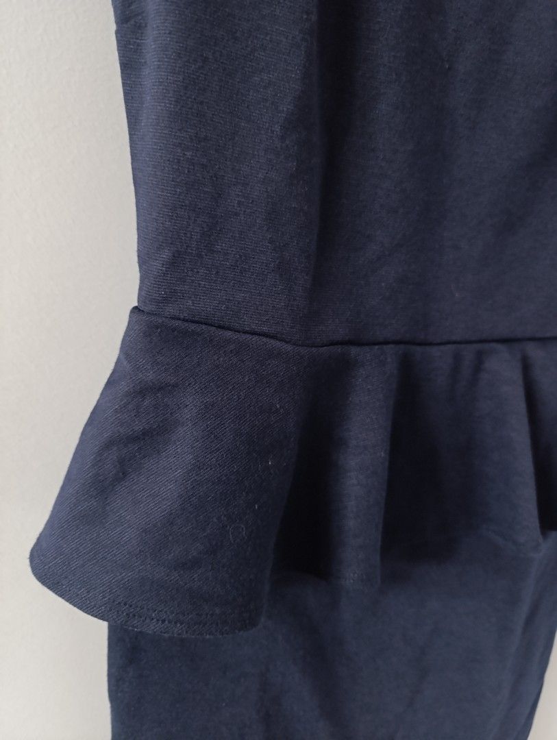 Forever 21 Navy Peplum Dress (Category: Dresses) located in Manila. Submitted by stuffsbybrix (Listing ID 1437484379, Image 3). Description: - Forever 21 navy blue dress - Size: M (best fit to small) - Features: - Peplum waist - Scoop neckline - Short sleeves - Fitted skirt flaws: see 2nd to the last photo (not visible) rfs: decluttering.