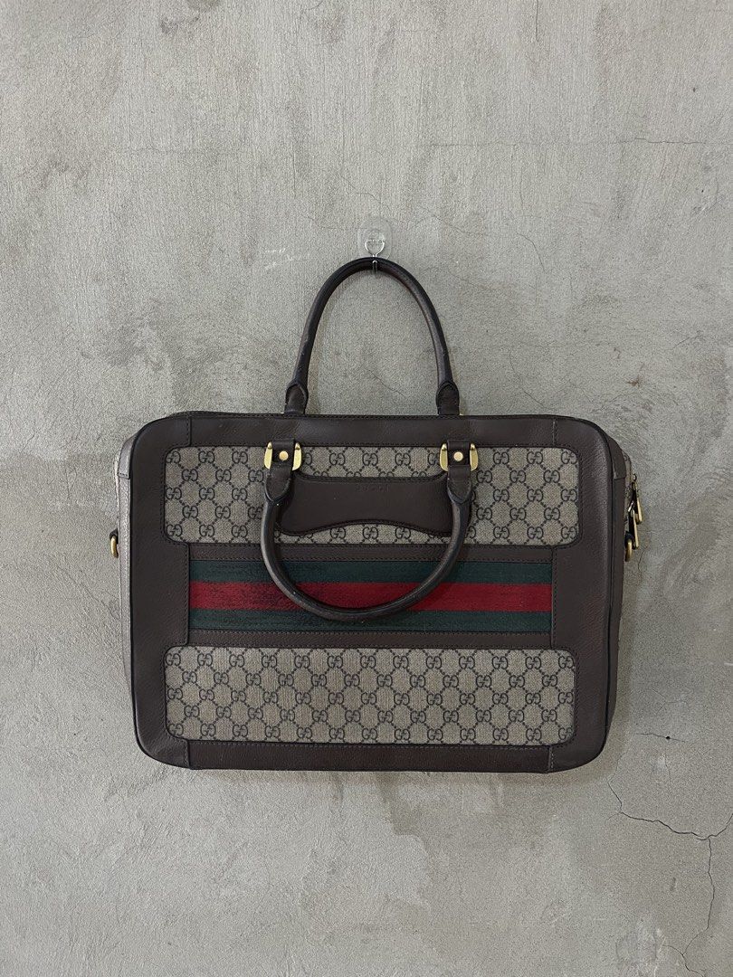 GUCCI GG motif briefcase (Category: Luxury Bags & Wallets) located in Cagayan de Oro. Submitted by vintagevvvictim (Listing ID 1437432784, Image 1). Description: Very good used condition interior needs cleaning some scratches on the fabric sherry line .