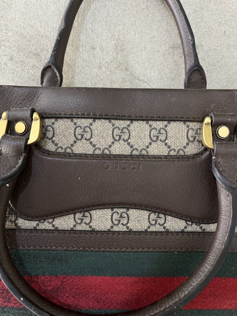 GUCCI GG motif briefcase (Category: Luxury Bags & Wallets) located in Cagayan de Oro. Submitted by vintagevvvictim (Listing ID 1437432784, Image 2). Description: Very good used condition interior needs cleaning some scratches on the fabric sherry line .