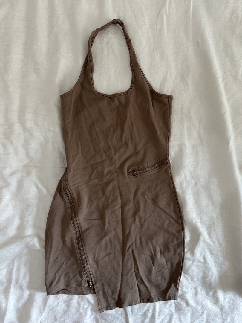 Halter Neck Mini Dress with Zippers (Category: Dresses) located in Mandaluyong City. Submitted by slickestb (Listing ID 1437452553, Image 1). Description: - Halter neck mini dress - Bodycon fit - Asymmetrical hemline - Features two zipper details - Solid brown color - Dress it up or down.