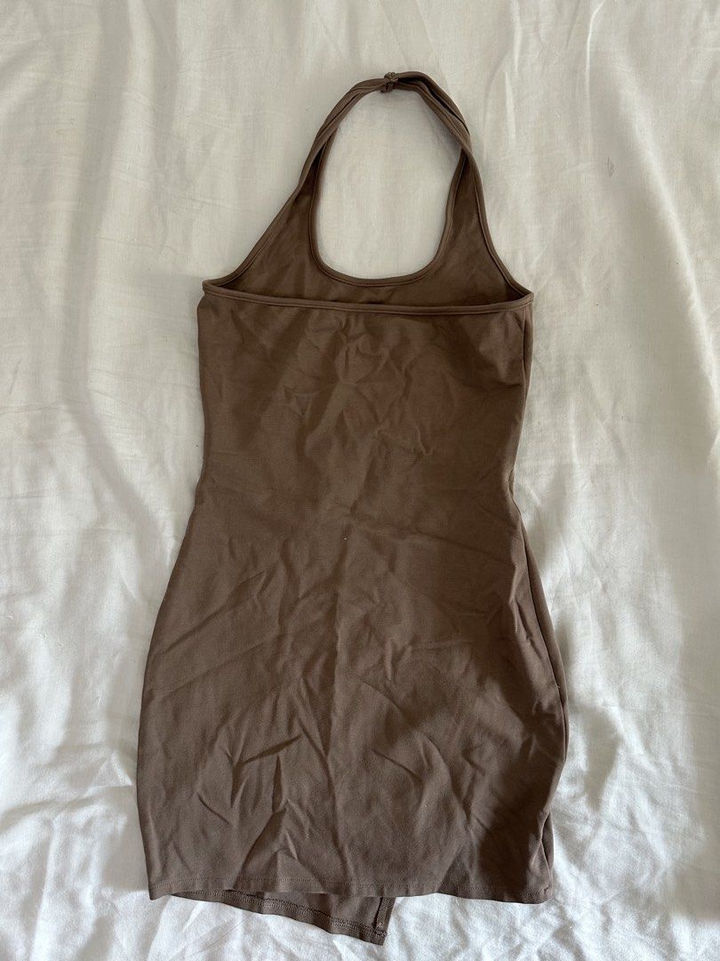 Halter Neck Mini Dress with Zippers (Category: Dresses) located in Mandaluyong City. Submitted by slickestb (Listing ID 1437452553, Image 2). Description: - Halter neck mini dress - Bodycon fit - Asymmetrical hemline - Features two zipper details - Solid brown color - Dress it up or down.