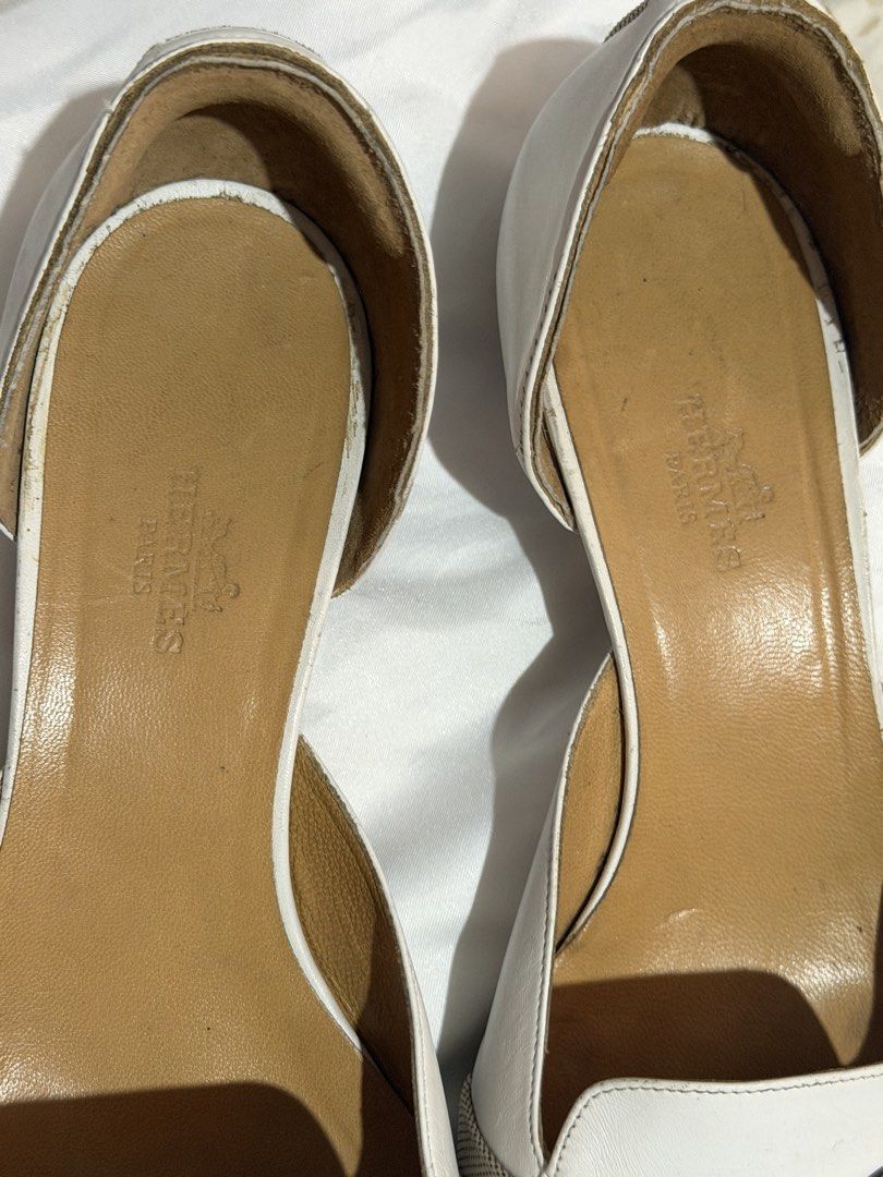 Hermes Paris White Leather Heels (Category: Heels) located in Rizal. Submitted by bingbong21 (Listing ID 1437418718, Image 2). Description: - Authentic Hermes Paris heels - White leather exterior - Pointed toe - Beige fabric strap with buckle closure - Hermes logo stamped insole - Size 37 1/2 - Made in Italy -ship via JNT/LBC/lalamove.