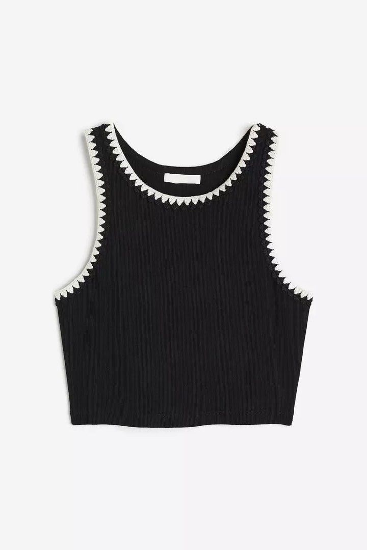 H&M Lace trimmed crop top (Category: Sleeveless) located in Quezon City. Submitted by tan__k (Listing ID 1437488985, Image 1). Description: color black size XS Cropped tank top in ribbed cotton jersey with crochet-look lace trim at neckline and armholes..