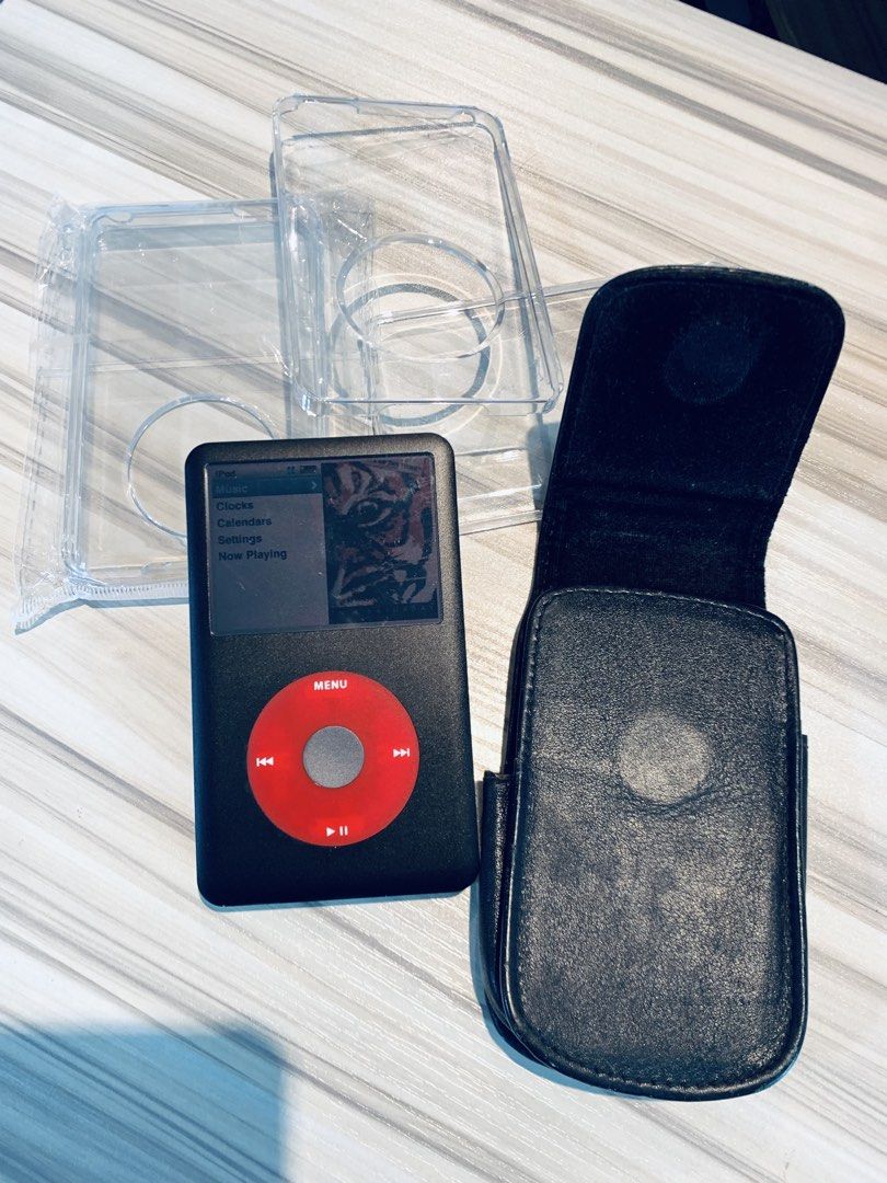 iPod Classic U2 Version (Category: Portable Music Players) located in Singapore. Submitted by price2sell (Listing ID 1437413591, Image 3). Description: Collector item iPod 7th Gen 160gb Selling as Bundle Full set Docking Unit with Remote and Power Adapter With Build-In Speaker / Charging and LED Light. Item comes with an Original Leather Pouch 2 pcs Brand New Protective Case. All in Good Working Condition and in Perfect Cosmetic Condition 👍 Bran