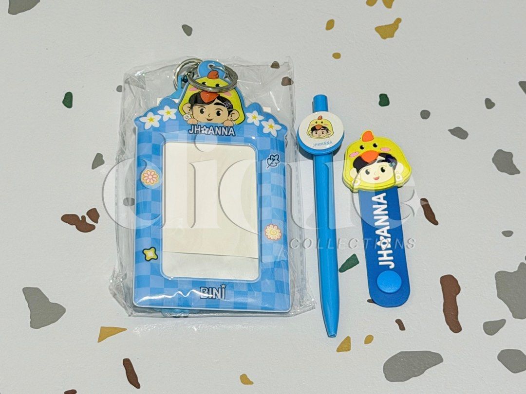 JHOANNA NBS MERCH (Category: Other Merchandise) located in Manila. Submitted by cliquecollections (Listing ID 1437422493, Image 1). Description: BINI JHOANNA NATIONAL BOOKSTORE SET INCLUSIONS: - PHOTOCARD HOLDER V2 - CABLE ORGANIZER - BALLPEN • WITH FREEBIES • FREE SECURED PACKAGING FEE • 100% OFFICIAL AND IN GOOD CONDITION.