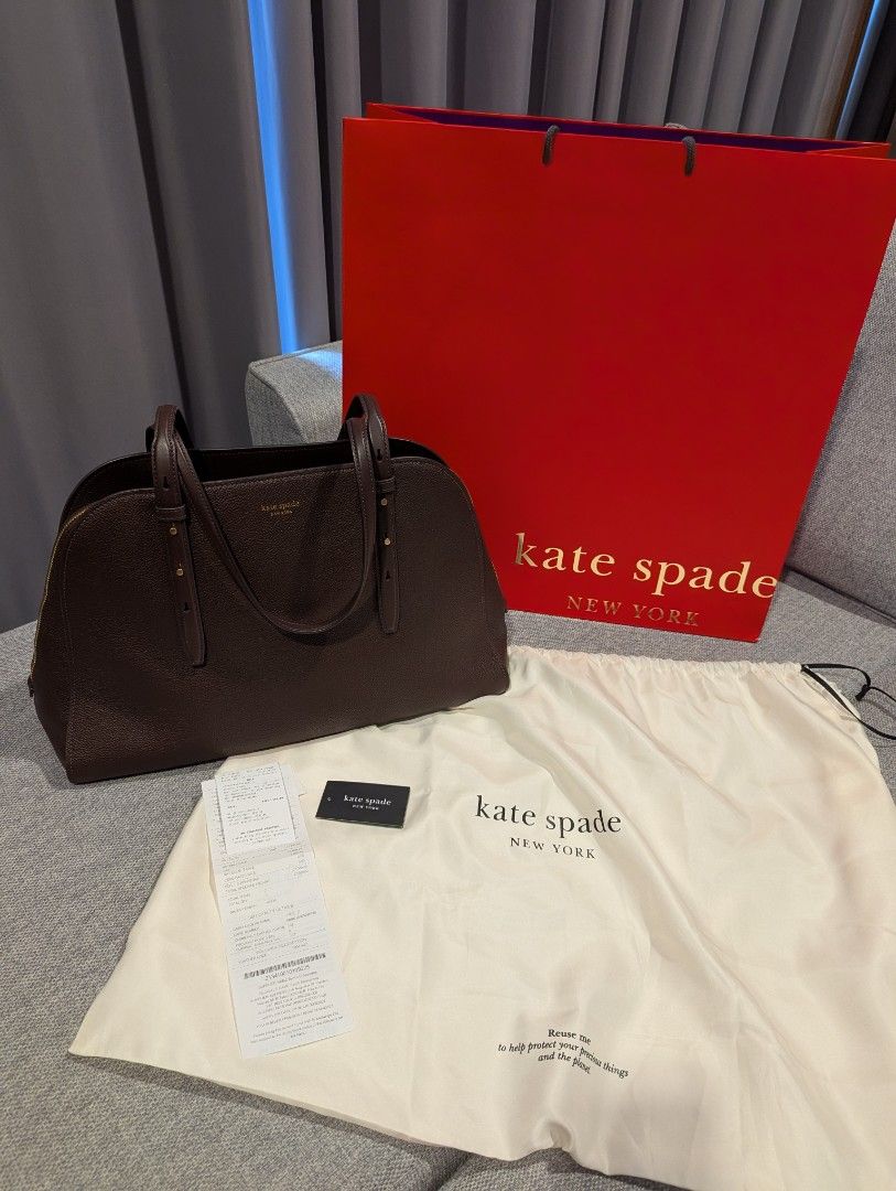 Kate Spade Maise Carryall Bag (Category: Tote Bags) located in Quezon City. Submitted by vert1cal (Listing ID 1437418612, Image 3). Description: Interior center zip compartment, two side compartments, two slip pockets Zip closure Fits iphone max, zip around continental wallet, ipad & 15" laptop Material: Pebbled leather and suede Dimensions: L 41.4cm x H 27cm x W 14cm Includes dust bag, care card, and shopping bag.